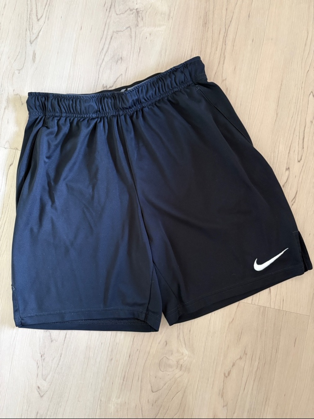 Nike Dri Fit Black Shorts with White Swoosh Logo and Pockets